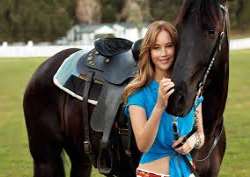 Lawrence was raised between the horses as her family owned a horse farm when she was a kid. The first horse that she rode as a kid was a pony called M